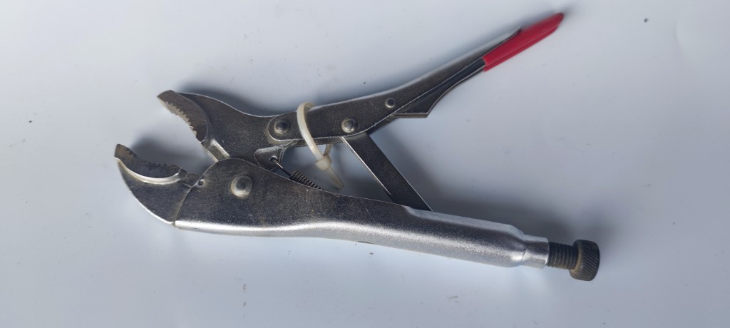 Затискні кліщі з фіксатором