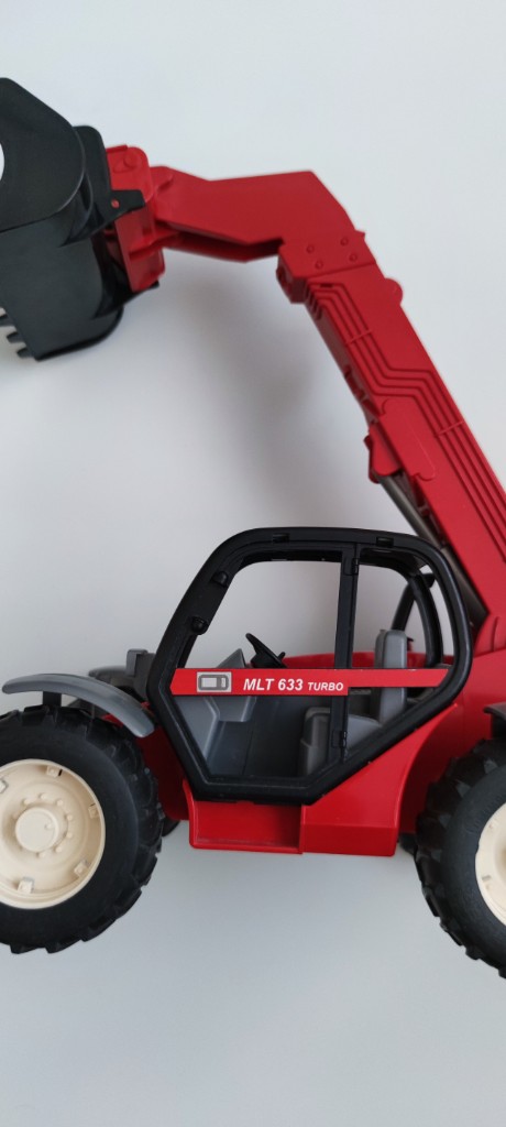 Іграшковий телескопічний навантажувач Manitou MLT 633 Turbo